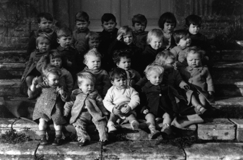 Children from the East End of London were cared for in a War Nursery in part of Bruern Abbey. (About 1940)